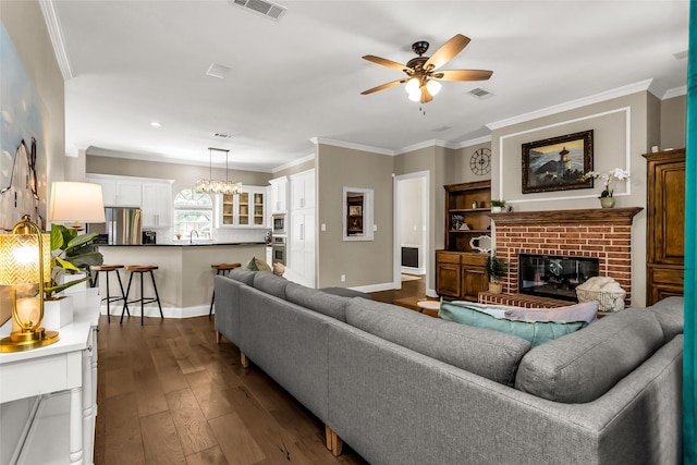 504 Glenbrook Ct, Southlake, TX 76092 - living room with ceiling fan, a fireplace, dark wood-style flooring, and visible vents