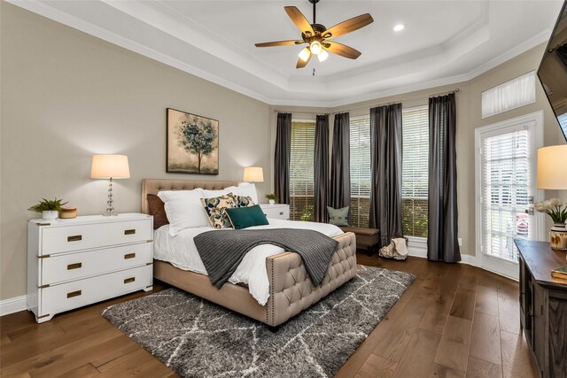 504 Glenbrook Ct, Southlake, TX 76092 - bedroom with crown molding, a raised ceiling, baseboards, dark wood-style floors, and recessed lighting