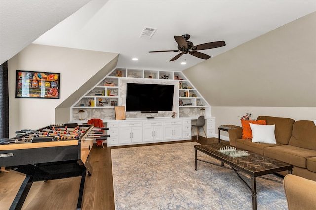504 Glenbrook Ct, Southlake, TX 76092 - living room with ceiling fan, built in shelves, wood finished floors, lofted ceiling, and visible vents