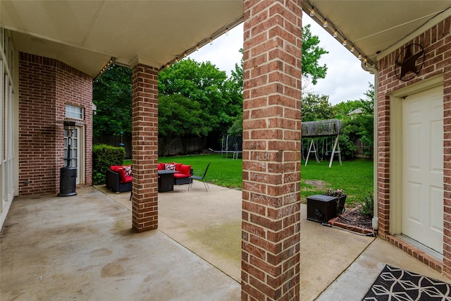 504 Glenbrook Ct, Southlake, TX 76092 - view of patio / terrace with an outdoor living space, a fenced backyard, and a trampoline
