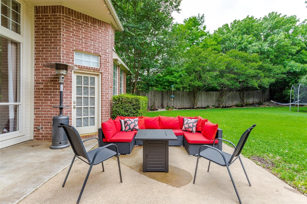 view of patio / terrace featuring an outdoor living space and fence private yard