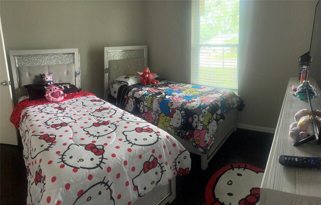 2551 Mossglen Dr, Dallas, TX 75227 - bedroom with baseboards