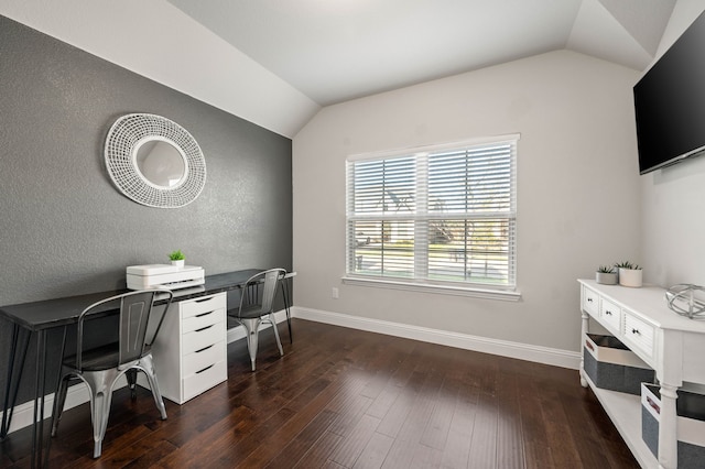 office area with baseboards, hardwood / wood-style floors, and lofted ceiling
