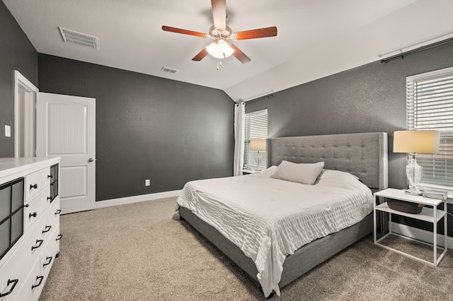 bedroom with multiple windows, carpet, and visible vents