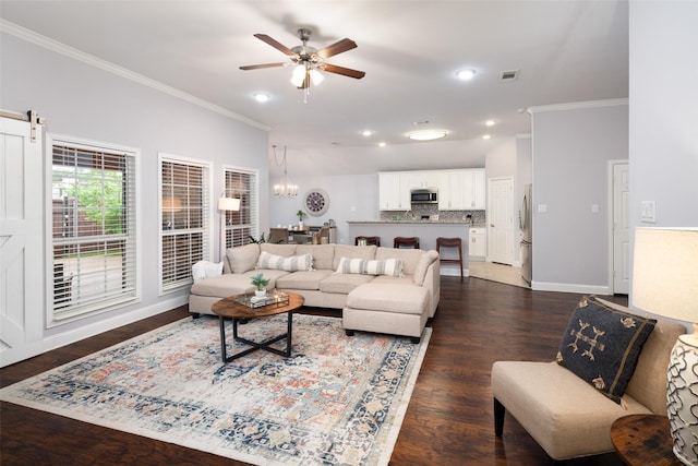 3050 Kinkaid Dr, Dallas, TX 75220 - living area with crown molding, ceiling fan, dark wood-style flooring, baseboards, and a chandelier