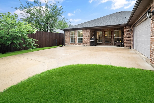 3050 Kinkaid Dr, Dallas, TX 75220 - view of patio / terrace featuring driveway and an attached garage