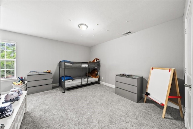 729 Rockwood St, Dallas, TX 75203 - carpeted bedroom featuring baseboards