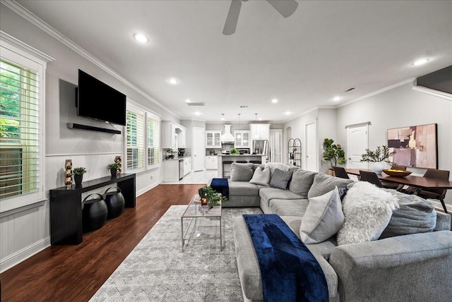 729 Rockwood St, Dallas, TX 75203 - living room with dark wood finished floors, ceiling fan, ornamental molding, recessed lighting, and baseboards
