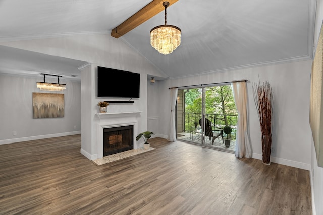 unfurnished living room featuring a chandelier, a fireplace with flush hearth, vaulted ceiling with beams, and wood finished floors