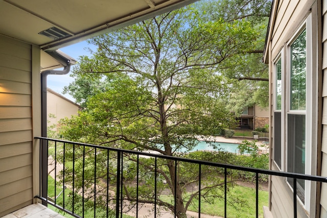 balcony featuring visible vents