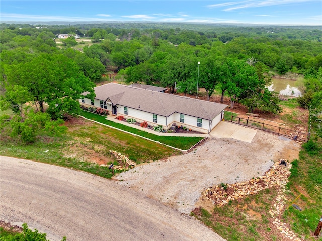 399 Wild Hill Oak Dr, Springtown, TX 76082 - birds eye view of property with a forest view