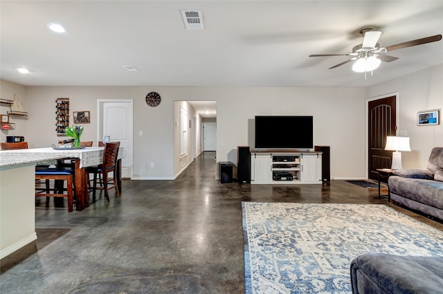 399 Wild Hill Oak Dr, Springtown, TX 76082 - living room with baseboards, ceiling fan, concrete flooring, and visible vents