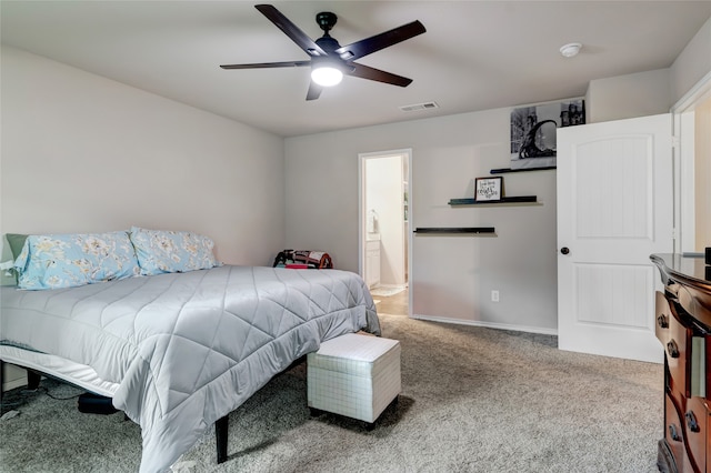 399 Wild Hill Oak Dr, Springtown, TX 76082 - carpeted bedroom with baseboards, ensuite bathroom, a ceiling fan, and visible vents