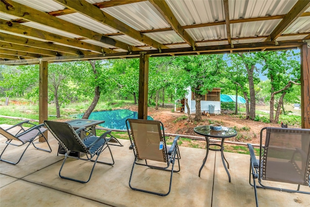 399 Wild Hill Oak Dr, Springtown, TX 76082 - view of patio / terrace featuring an outbuilding