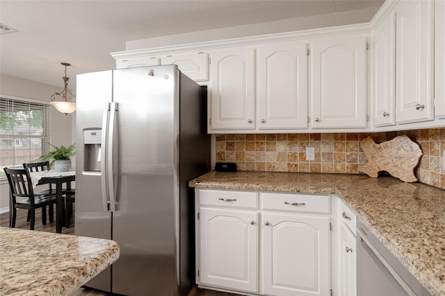 kitchen featuring white dishwasher, stainless steel fridge with ice dispenser, backsplash, and white cabinetry