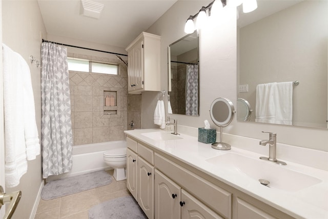 full bath featuring double vanity, a sink, shower / bathtub combination with curtain, and tile patterned floors