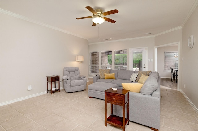 living area with light tile patterned floors, baseboards, ornamental molding, and ceiling fan