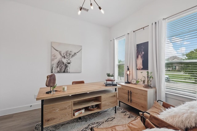 office area with baseboards, dark wood-style floors, and visible vents