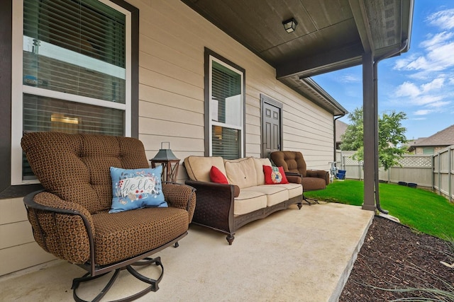 view of patio / terrace featuring fence