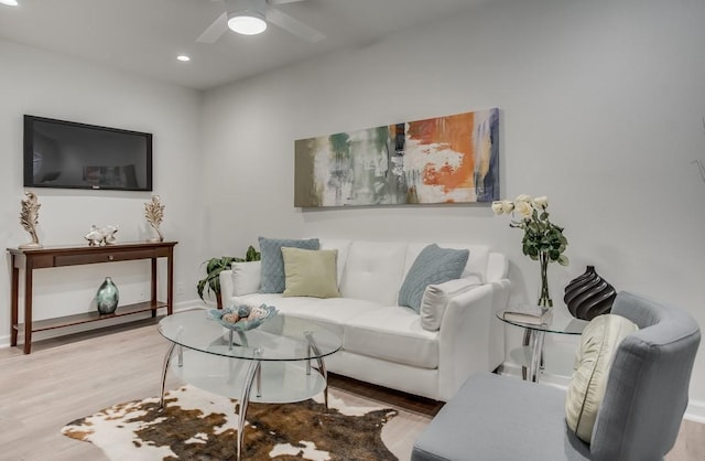 living area with recessed lighting, baseboards, ceiling fan, and wood finished floors