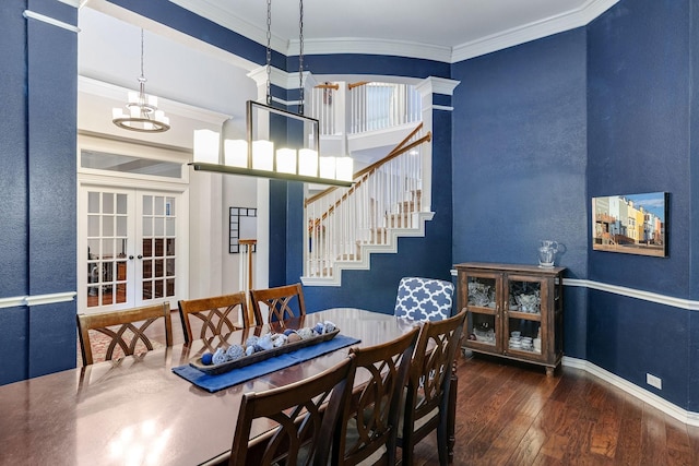 dining area featuring crown molding, baseboards, stairway, hardwood / wood-style flooring, and french doors