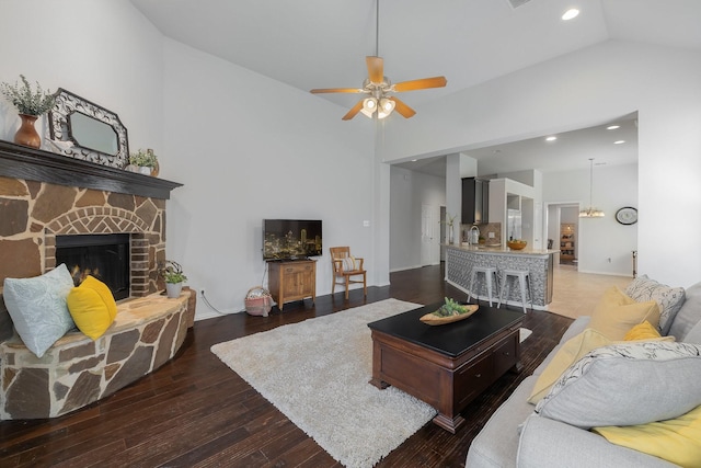 2308 Patriot Dr, Melissa, TX 75454 - living room with a ceiling fan, a fireplace, high vaulted ceiling, recessed lighting, and hardwood / wood-style floors