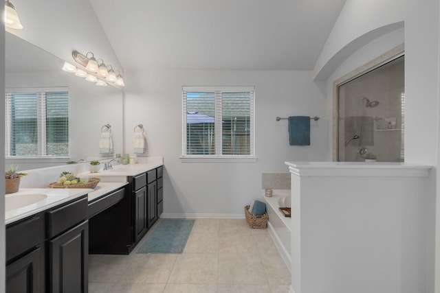 2308 Patriot Dr, Melissa, TX 75454 - bathroom featuring a bath, tile patterned flooring, a walk in shower, vanity, and lofted ceiling