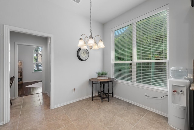 2308 Patriot Dr, Melissa, TX 75454 - dining space with baseboards, an inviting chandelier, light tile patterned floors, and visible vents
