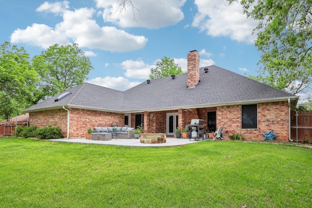 back of house with a chimney, brick siding, fence, outdoor lounge area, and a shingled roof