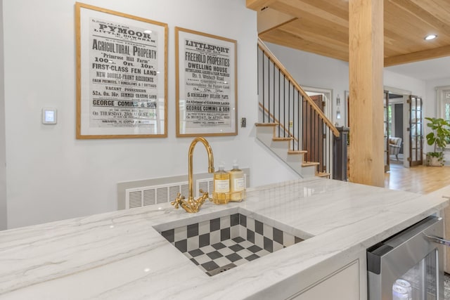 417 N Waddill St, Mckinney, TX 75069 - kitchen with light stone countertops, recessed lighting, and a sink