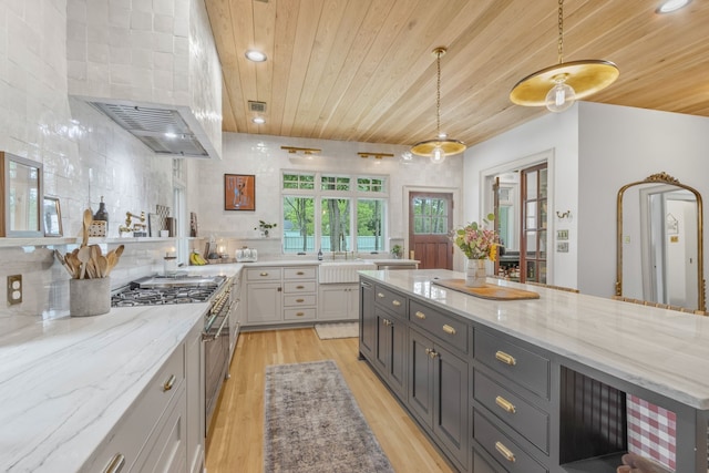 417 N Waddill St, Mckinney, TX 75069 - kitchen featuring wooden ceiling, a sink, light wood-type flooring, light stone counters, and wall chimney range hood