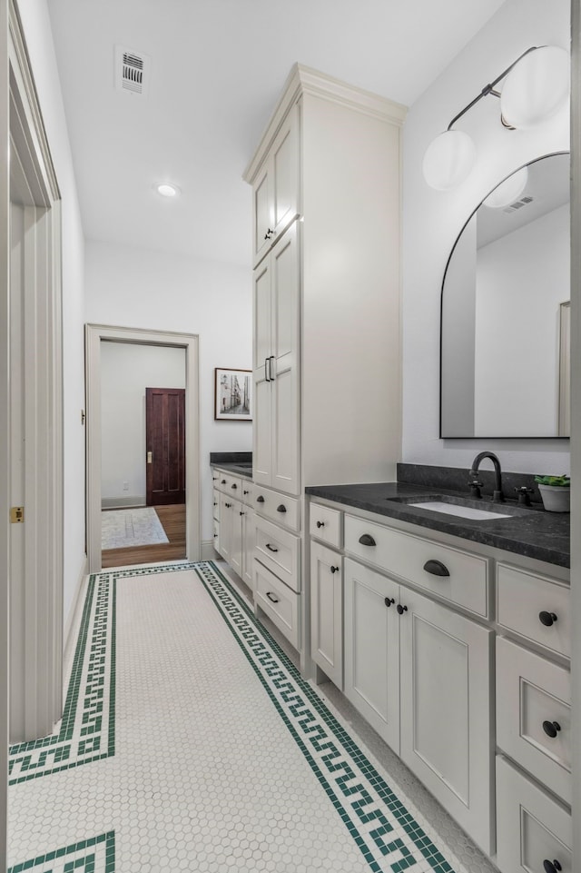 417 N Waddill St, Mckinney, TX 75069 - bathroom with vanity and recessed lighting