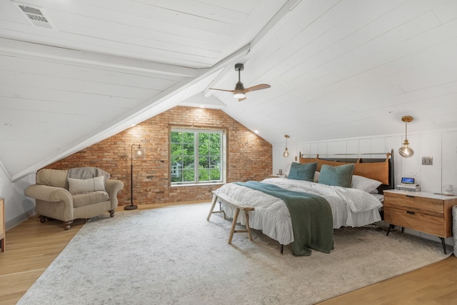 417 N Waddill St, Mckinney, TX 75069 - bedroom with light wood-style floors, brick wall, and a ceiling fan