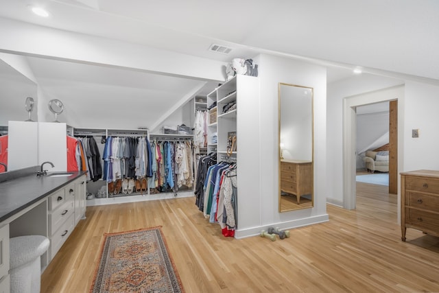 417 N Waddill St, Mckinney, TX 75069 - walk in closet featuring light wood finished floors and a sink