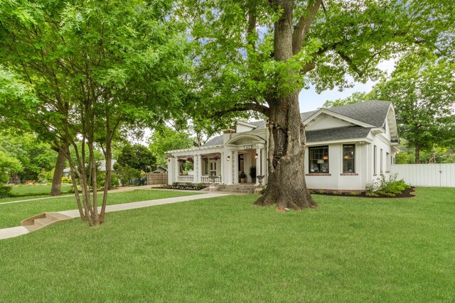417 N Waddill St, Mckinney, TX 75069 - view of front of house with a shingled roof and covered porch