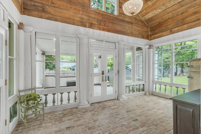 417 N Waddill St, Mckinney, TX 75069 - sunroom featuring french doors, plenty of natural light, high vaulted ceiling, brick flooring, and wooden ceiling