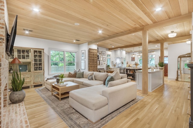 417 N Waddill St, Mckinney, TX 75069 - living room with wooden ceiling with exposed beams, light wood-style flooring, and recessed lighting