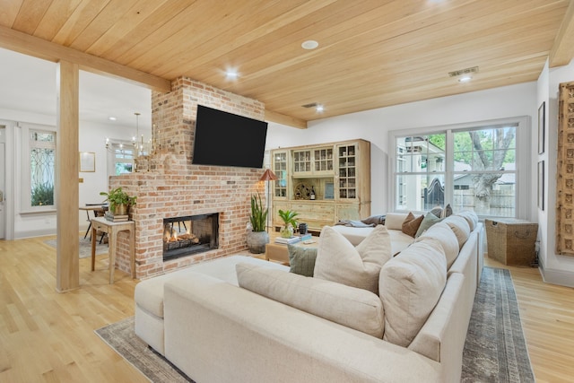417 N Waddill St, Mckinney, TX 75069 - living area featuring a fireplace, wood ceiling, light wood-style floors, and recessed lighting