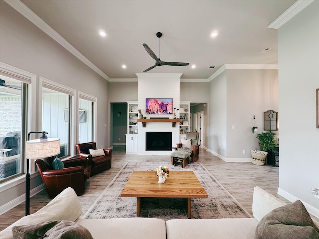 living area featuring recessed lighting, ceiling fan, and light wood-type flooring