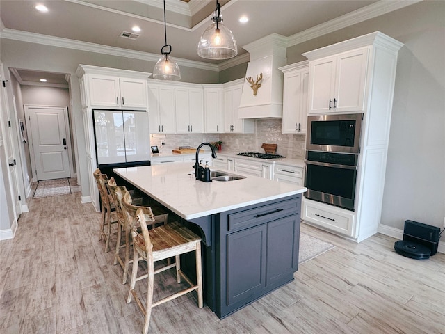 232 Conti Way, Bossier City, LA 71111 - kitchen featuring appliances with stainless steel finishes, a sink, white cabinets, ornamental molding, and baseboards