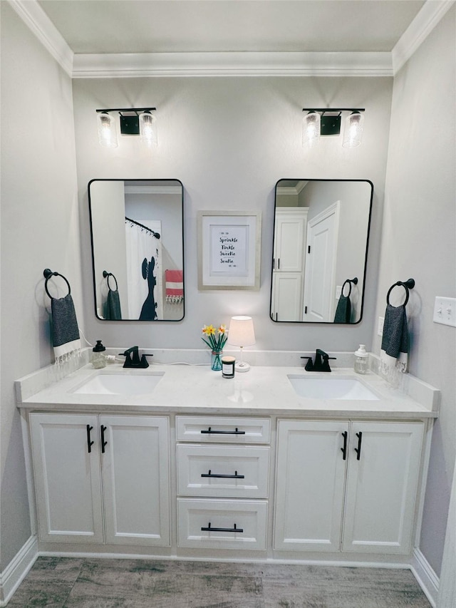 232 Conti Way, Bossier City, LA 71111 - bathroom featuring double vanity, ornamental molding, and baseboards
