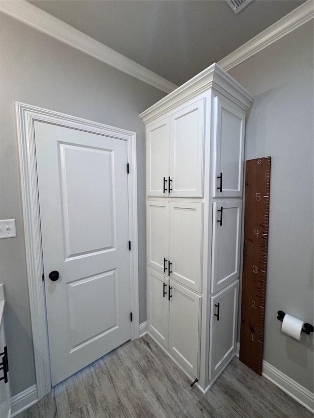 232 Conti Way, Bossier City, LA 71111 - hallway with light wood-style floors, baseboards, and ornamental molding