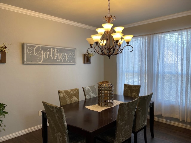 dining area featuring baseboards, ornamental molding, a notable chandelier, and dark wood-style floors