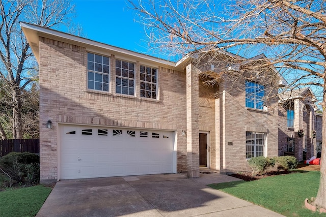 traditional-style house with a garage, fence, driveway, and brick siding