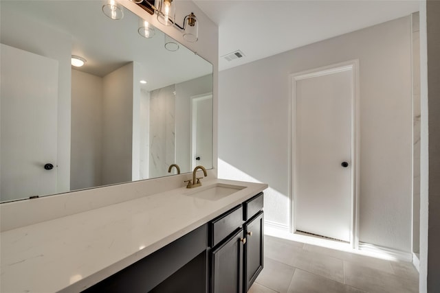 full bathroom with a walk in shower, vanity, tile patterned floors, and visible vents