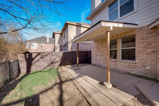 view of yard featuring a fenced backyard and a patio
