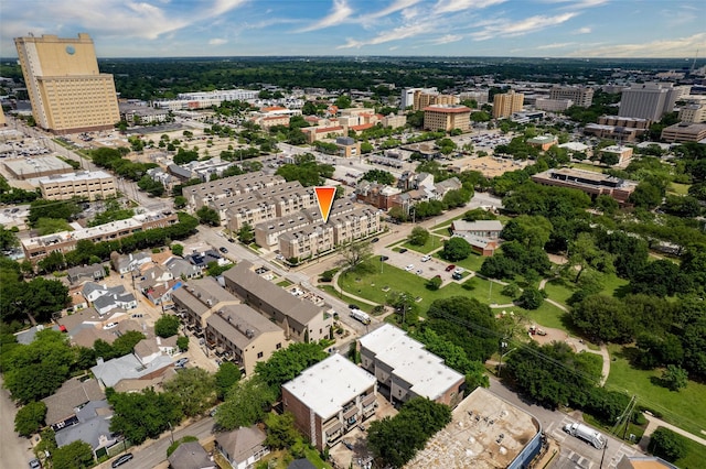 birds eye view of property featuring a city view