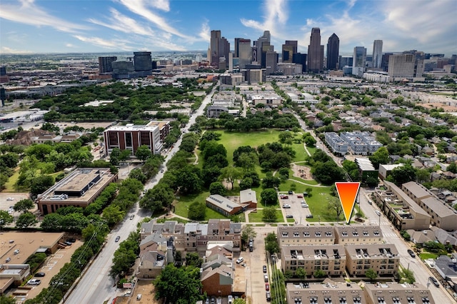 birds eye view of property with a view of city