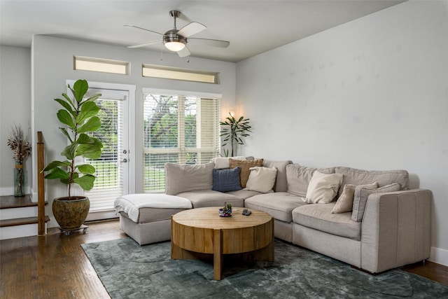living area featuring ceiling fan and wood finished floors