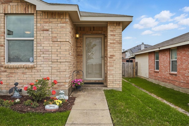 712 Riverflat Dr, Fort Worth, TX 76179 - property entrance with a lawn and fence